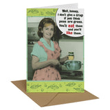 a woman in apron holding a pan and a sign