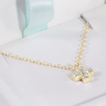 14kt Gold and Diamond Signature Cross Necklace_E Newton_COUESGDSC