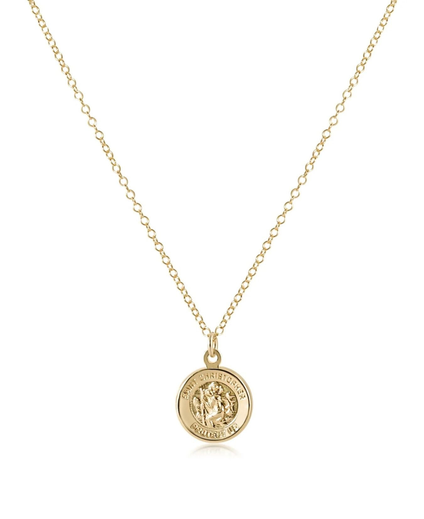 a gold necklace with a coin