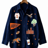 a blue shirt with stickers on it