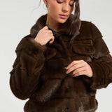 a woman in a fur coat