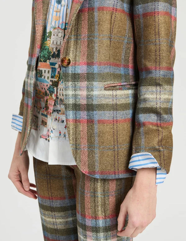 a person wearing a plaid suit