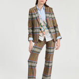a woman in a plaid suit