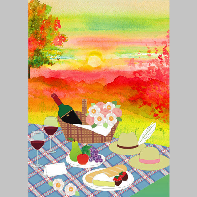 a picnic table with food and wine