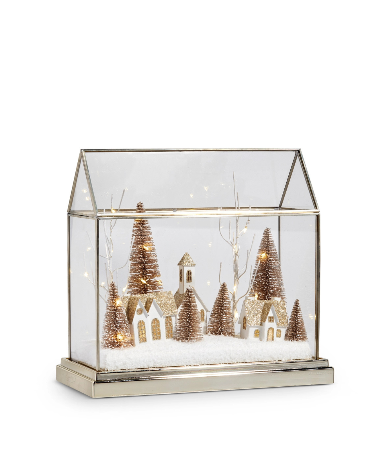 a glass case with a small village in it