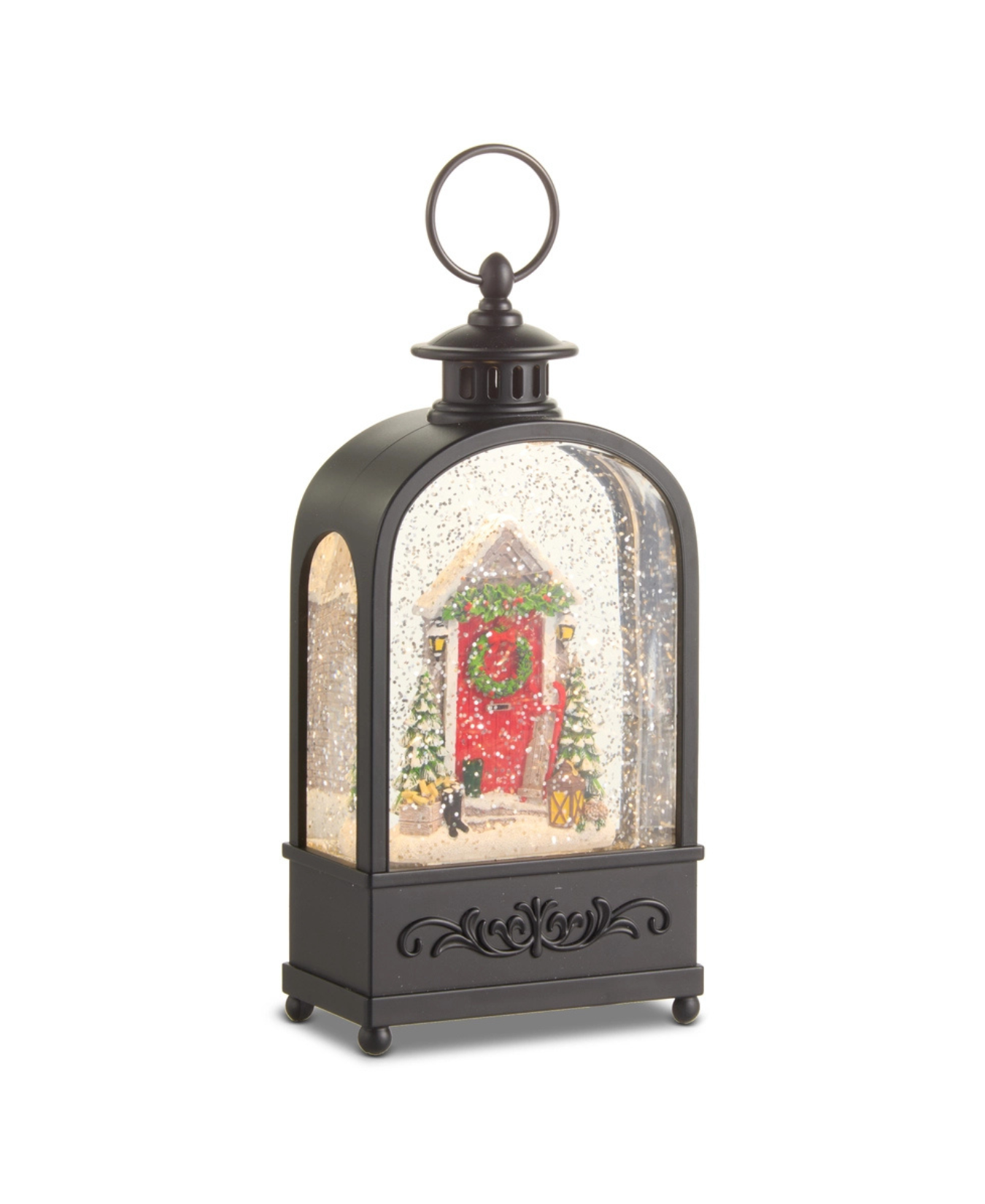 a black lantern with a snow globe