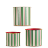 a group of striped tins
