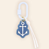 a key chain with a anchor on it