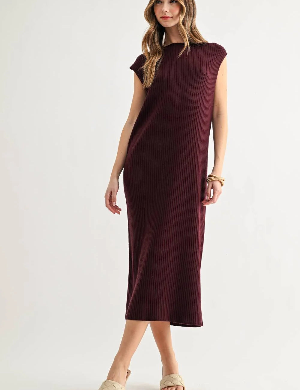 a woman in a long dress