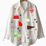 a white shirt with pictures on it