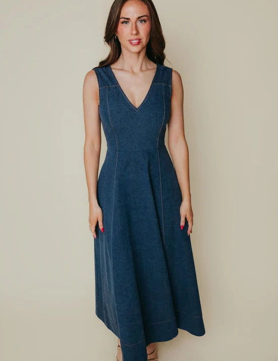 a woman in a blue dress