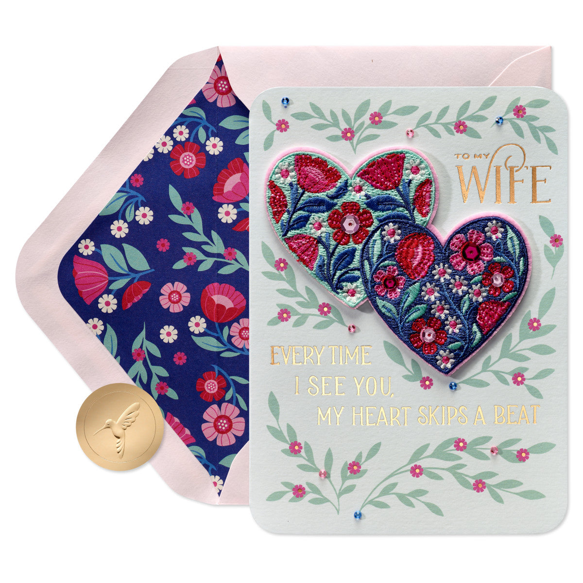 a card with two hearts and a gold coin