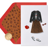a card with a picture of a dress and shoes