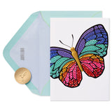 a butterfly card with a gold coin