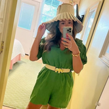 a woman taking a selfie in a mirror