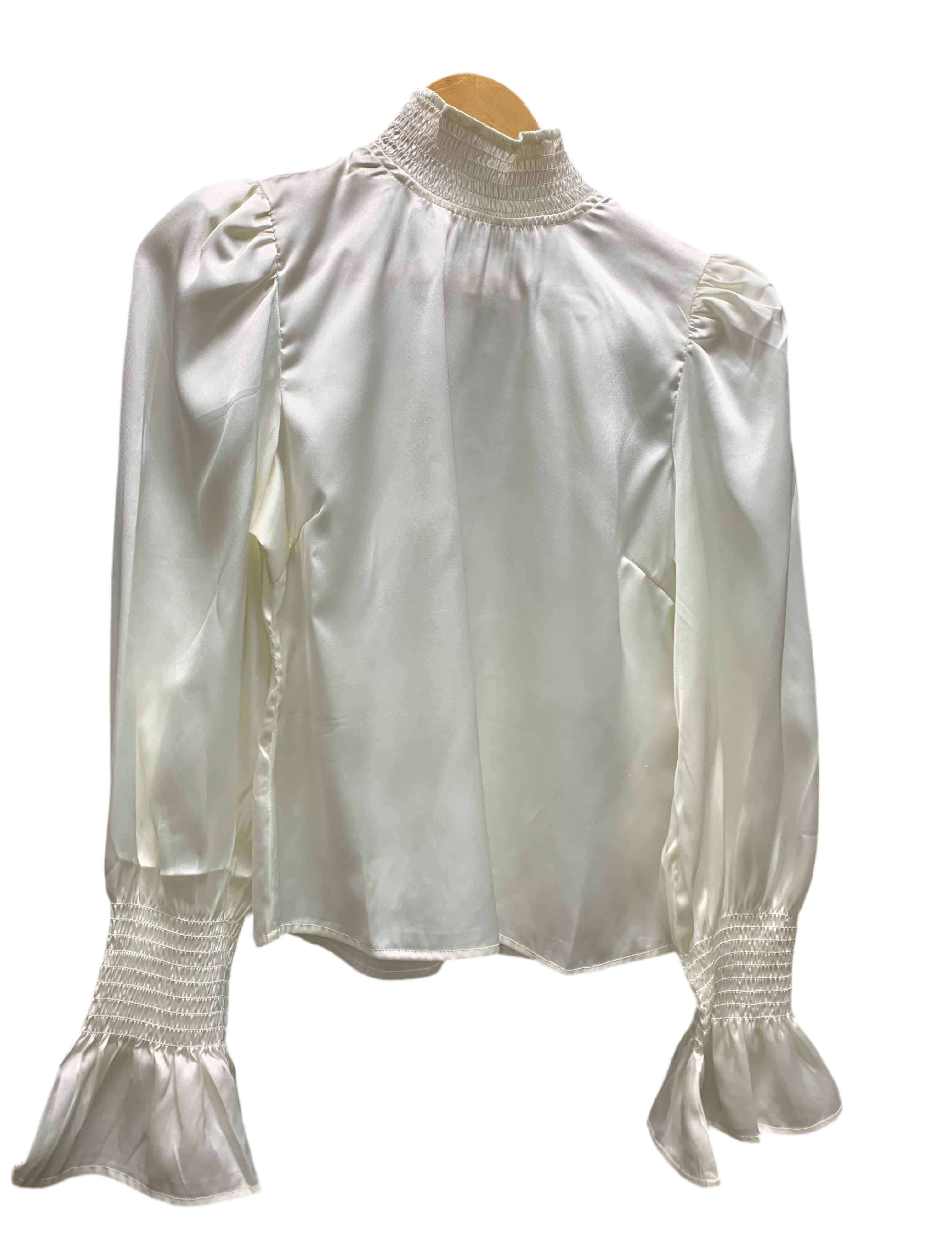 a white blouse with ruffles