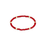 a red and gold beaded bracelet