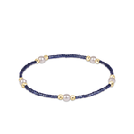 a blue and gold beaded bracelet