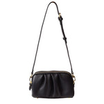 a black purse with a strap