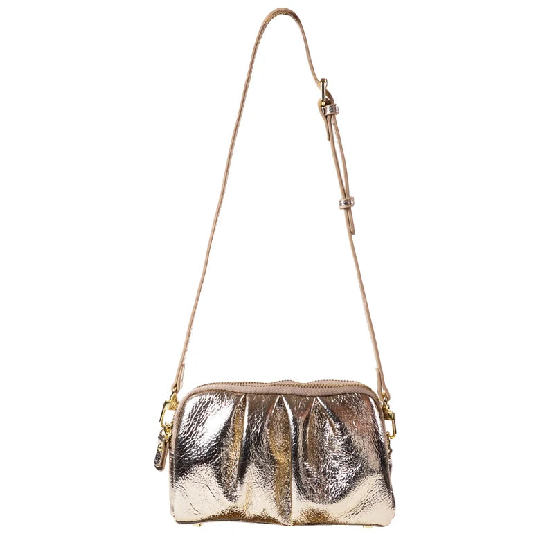 a silver purse with a strap