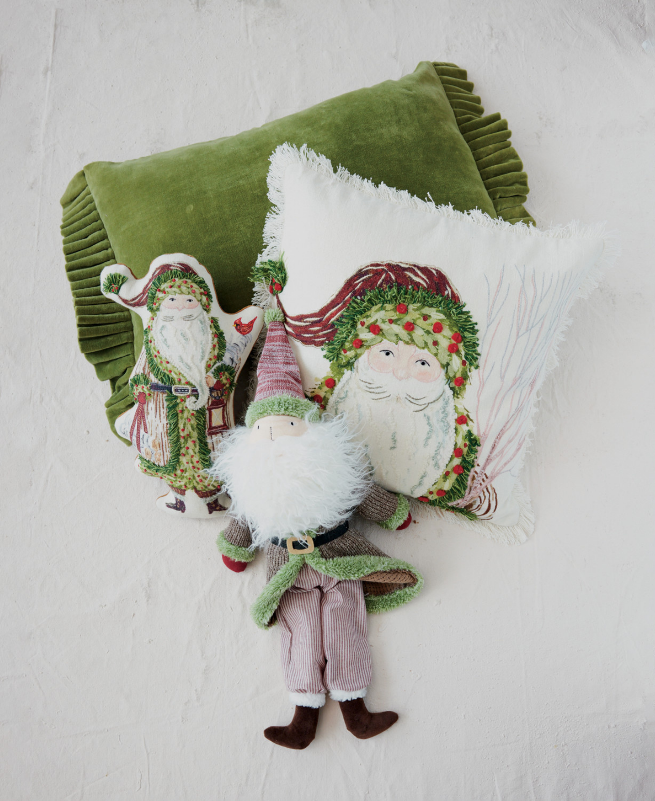 a group of stuffed toys and pillows
