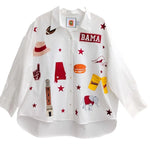 a white shirt with different stickers on it