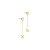 a pair of gold earrings