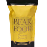 a yellow and black bag with black text