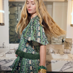 a woman in a green dress