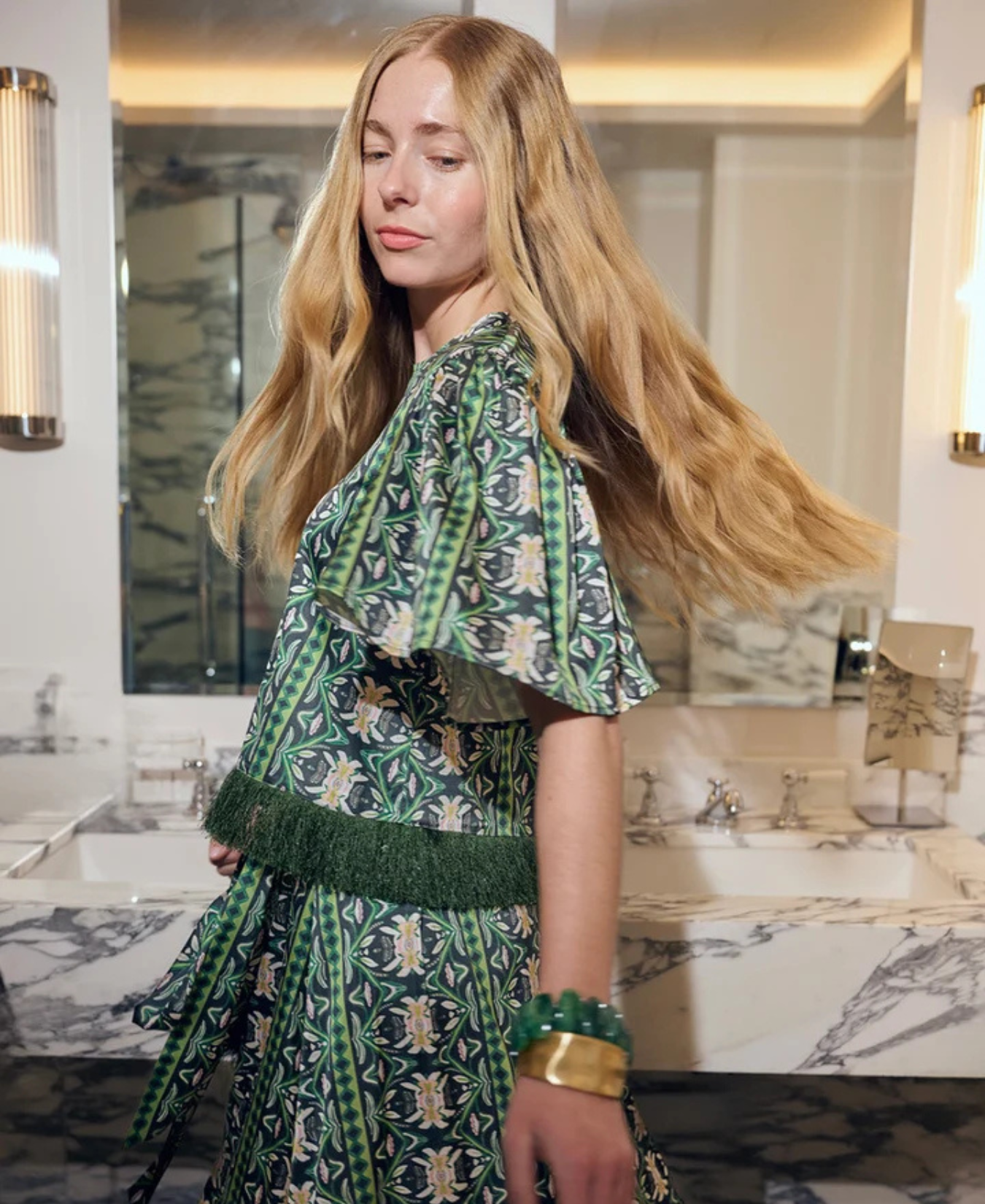 a woman in a green dress
