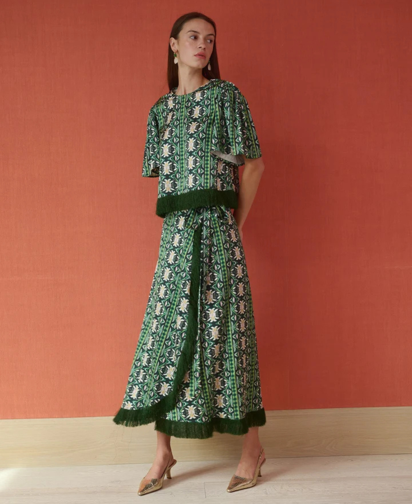 a woman in a green dress