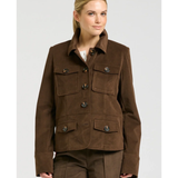 a woman in a brown jacket