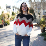 a woman smiling at camera