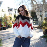 a woman in a sweater