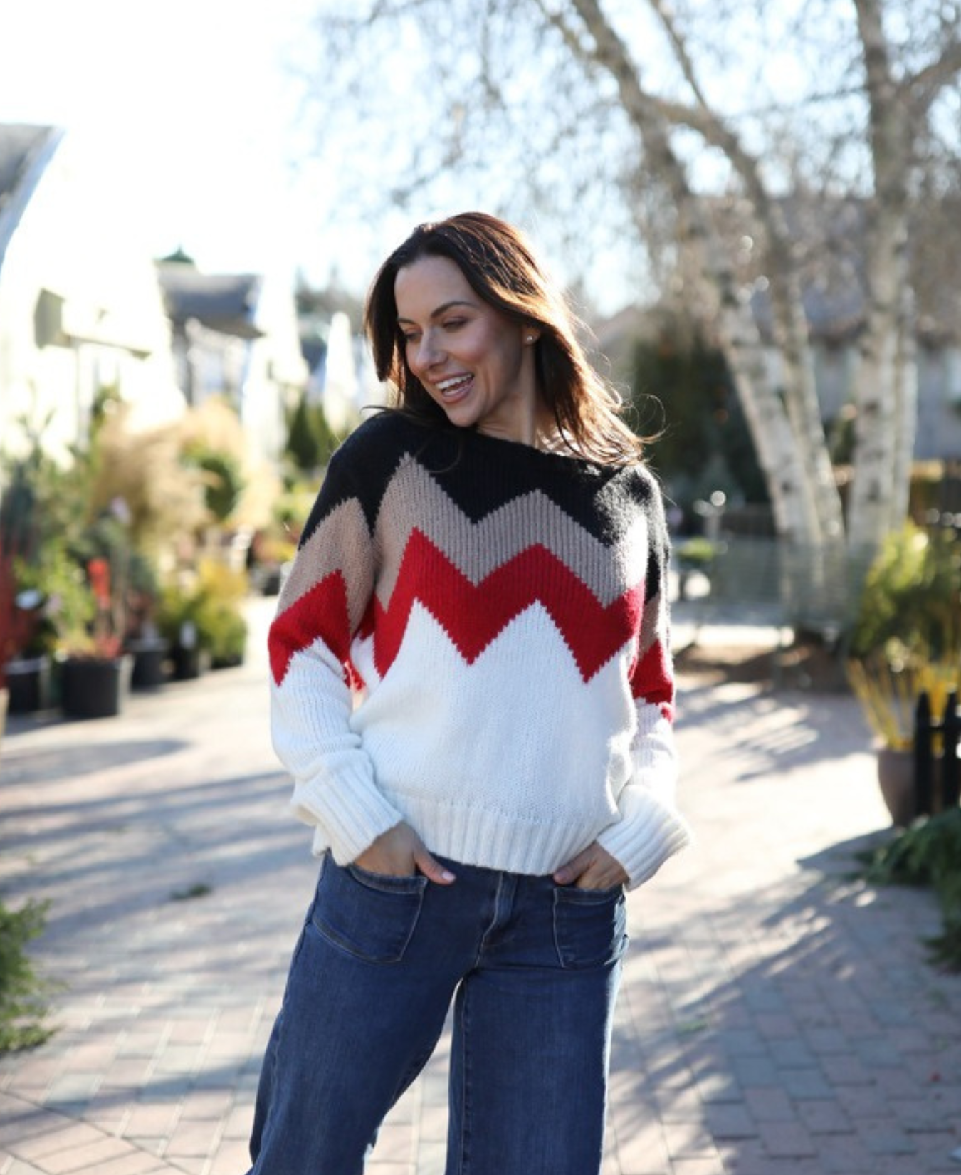 a woman in a sweater