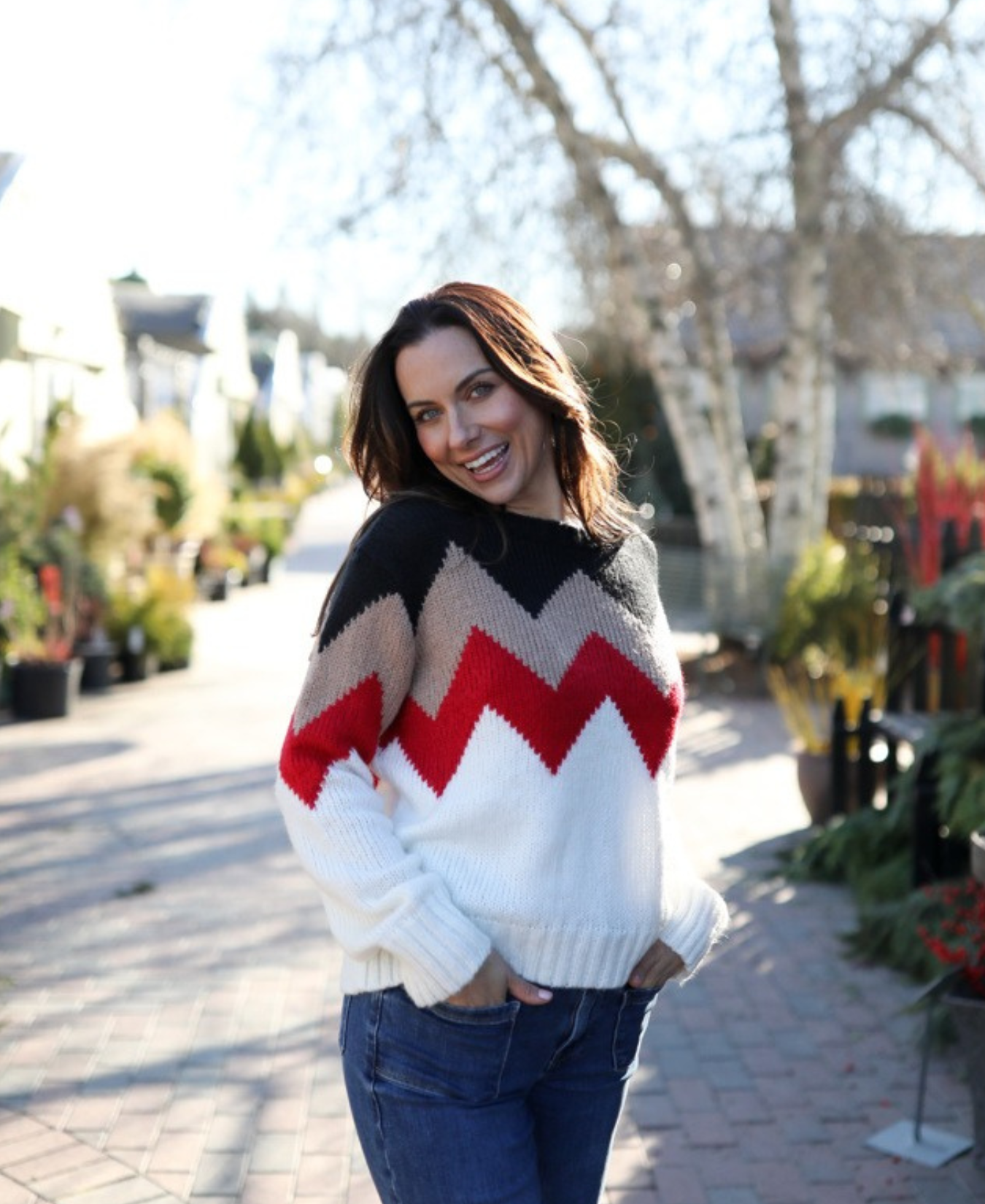 a woman smiling at camera