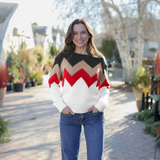a woman standing on a brick path