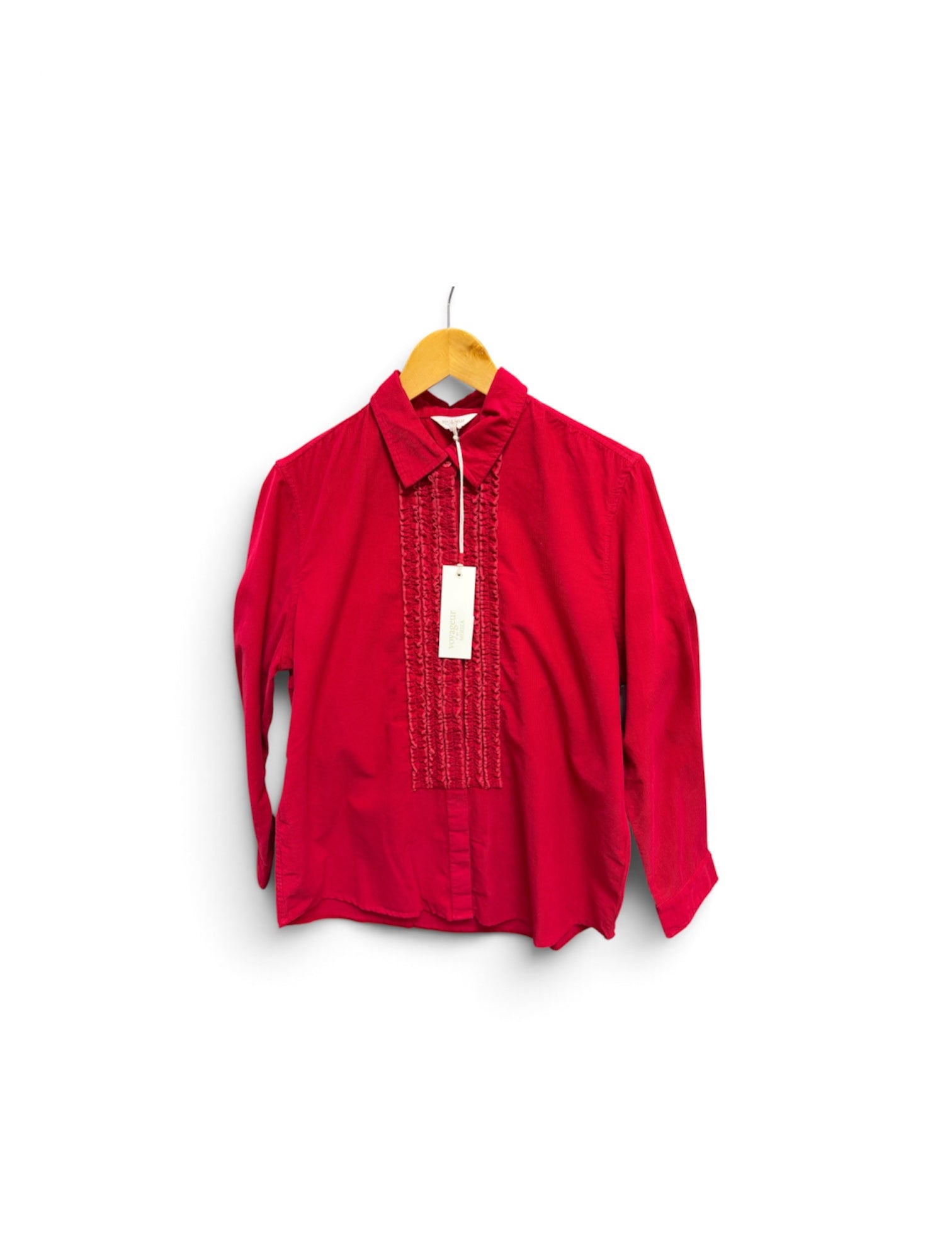 a red shirt with a tag on a swinger