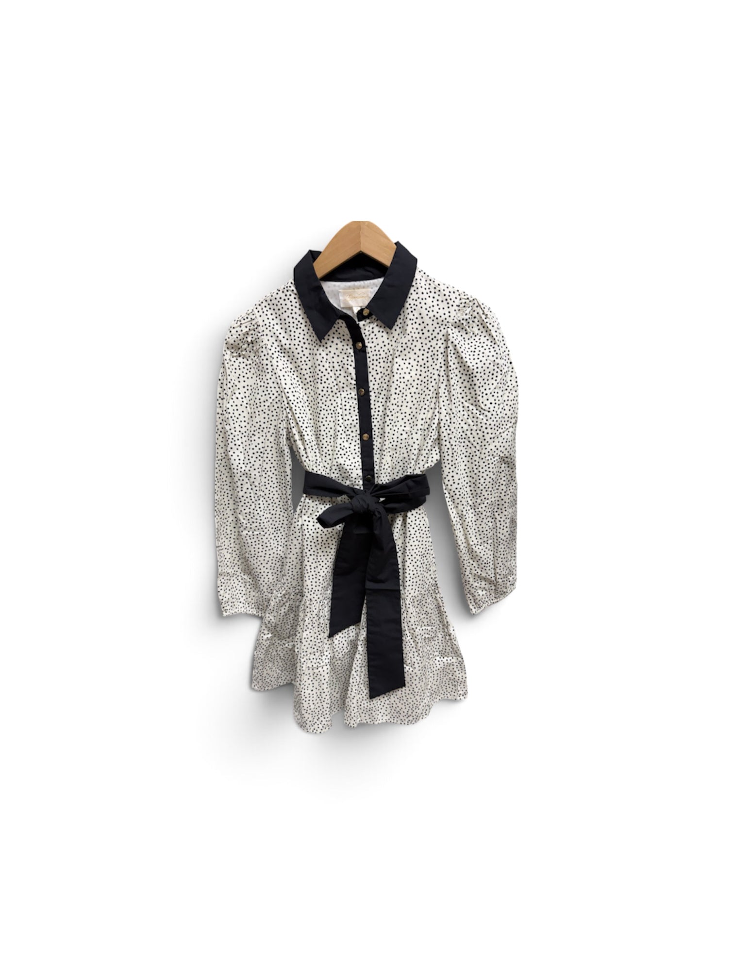 a white and black dress with a black belt