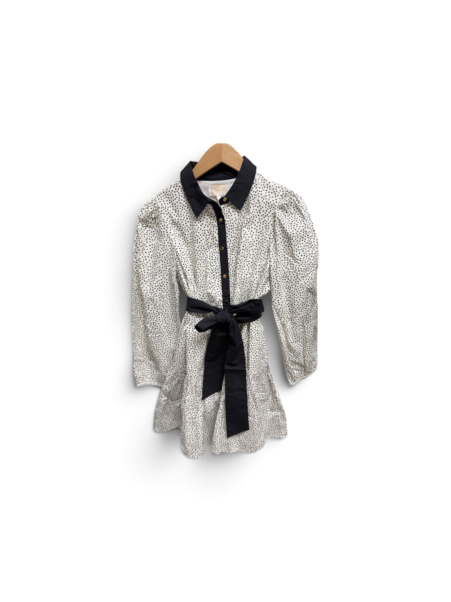 a white and black dress with a black belt