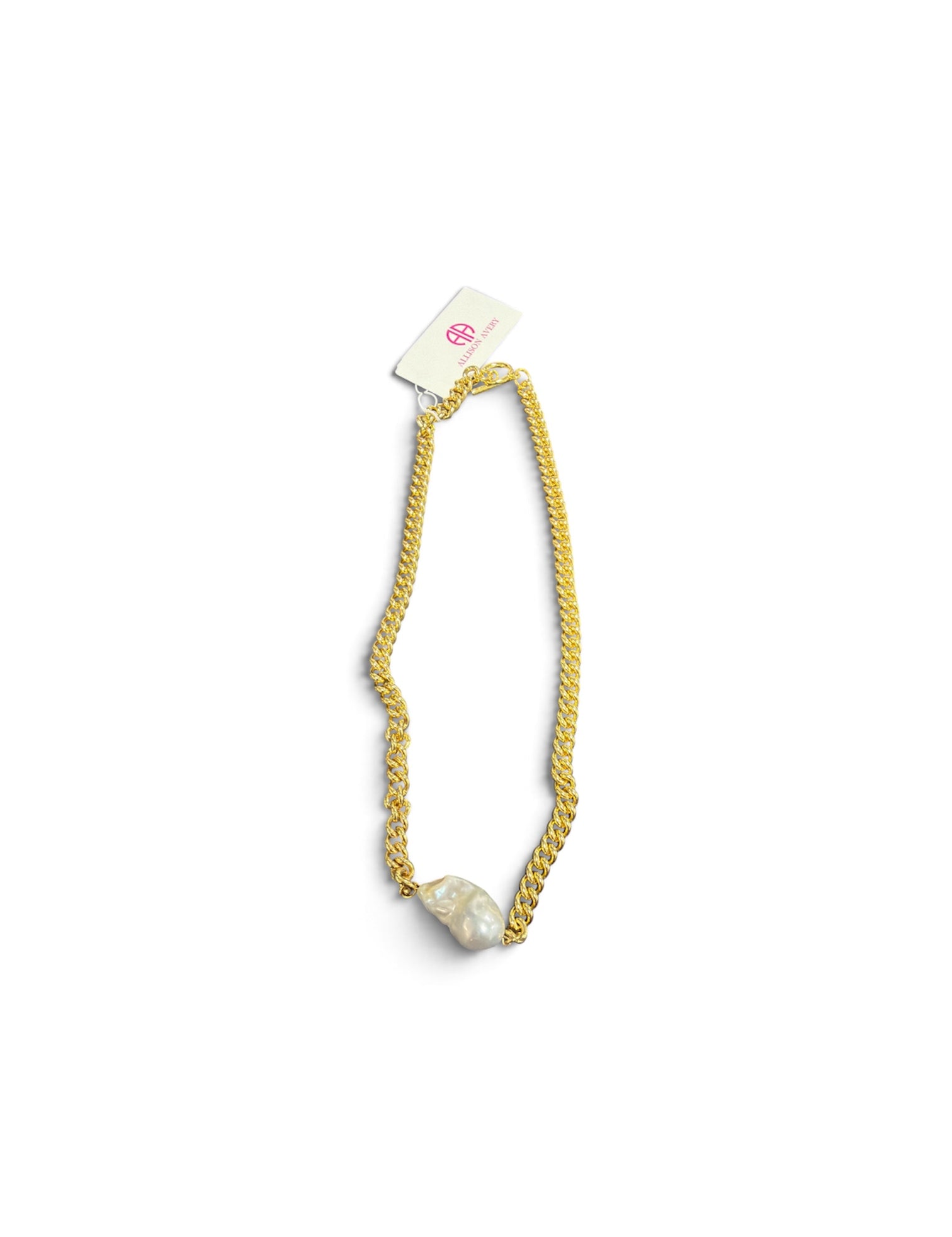 a gold chain with a pearl on it