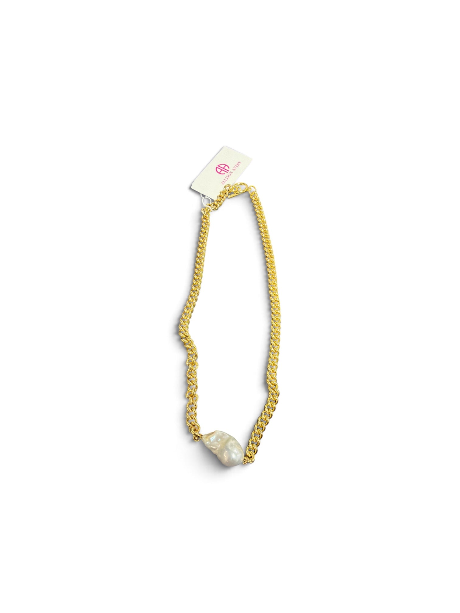 a gold chain with a pearl on it