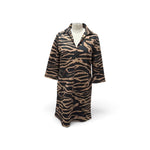 a zebra print coat on a mannequin