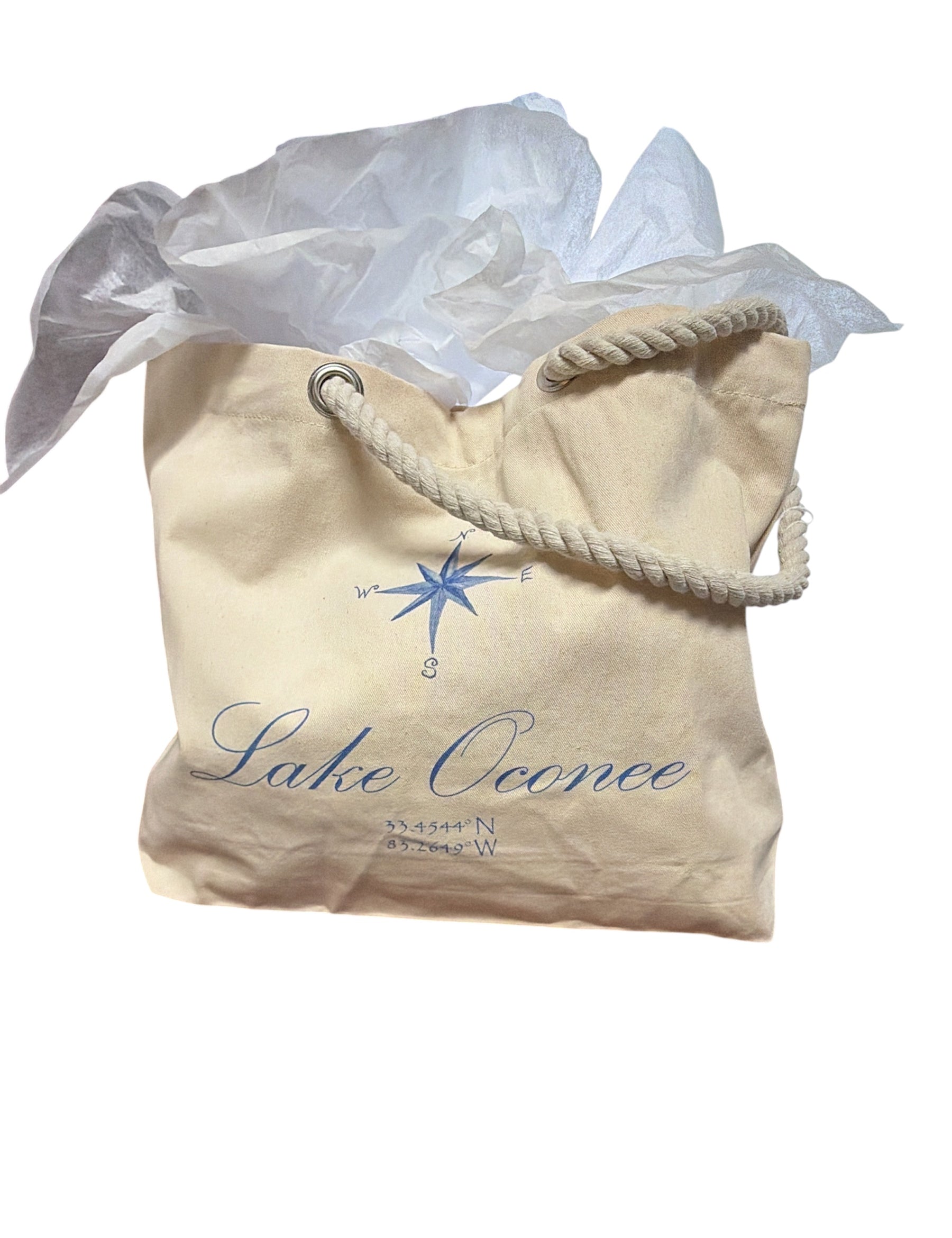 a bag with a rope handle and a white tissue paper