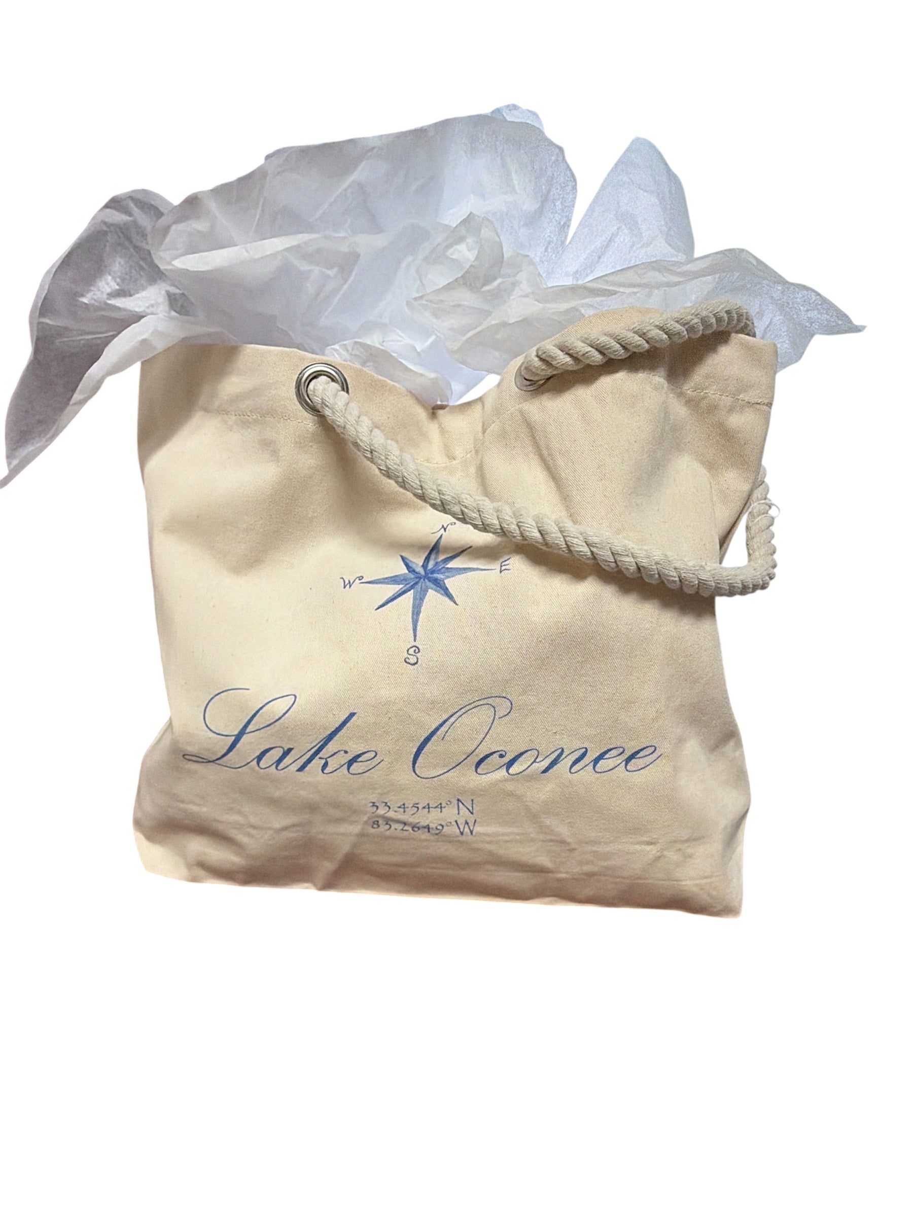 a bag with a rope handle and a white tissue paper