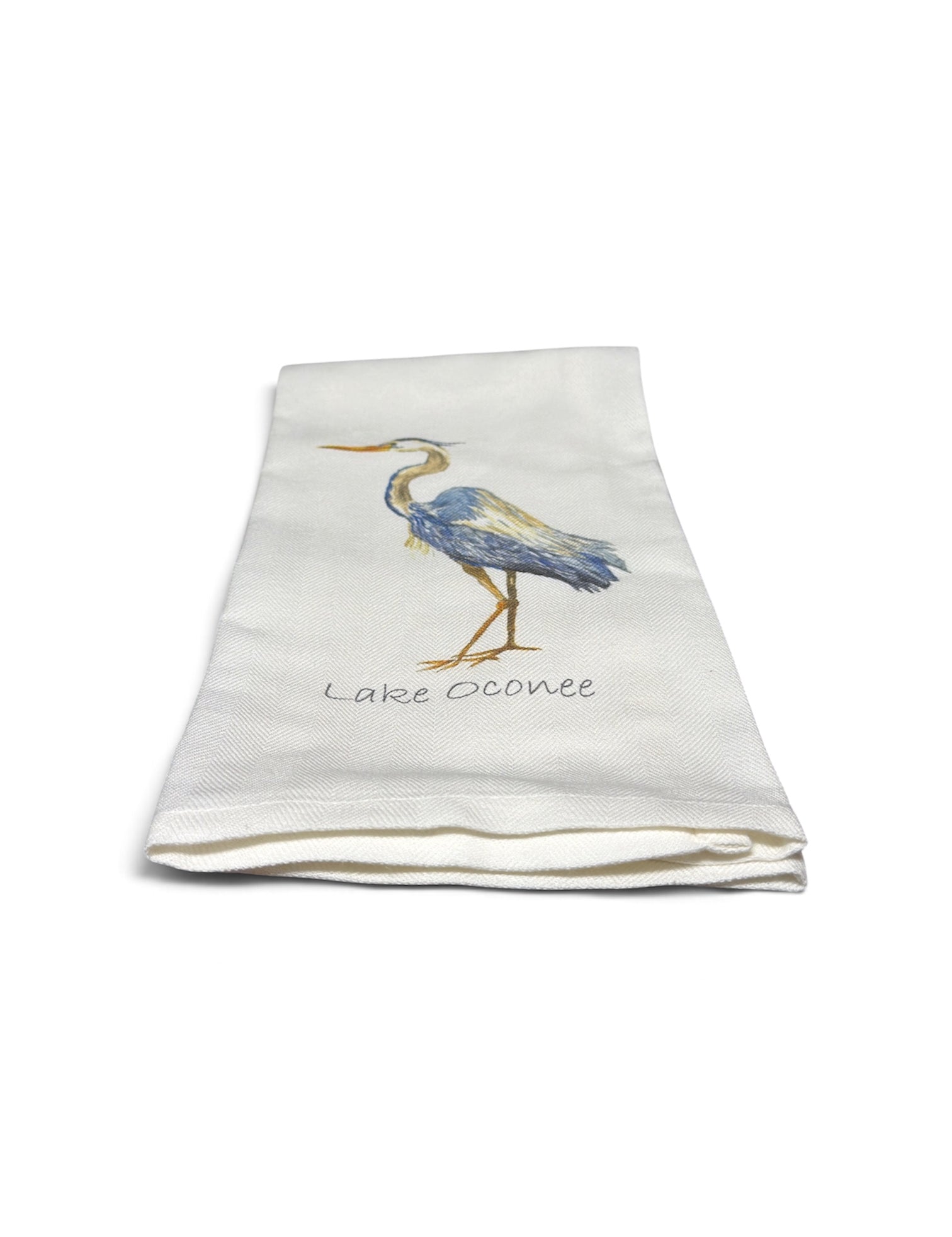 a white towel with a bird on it