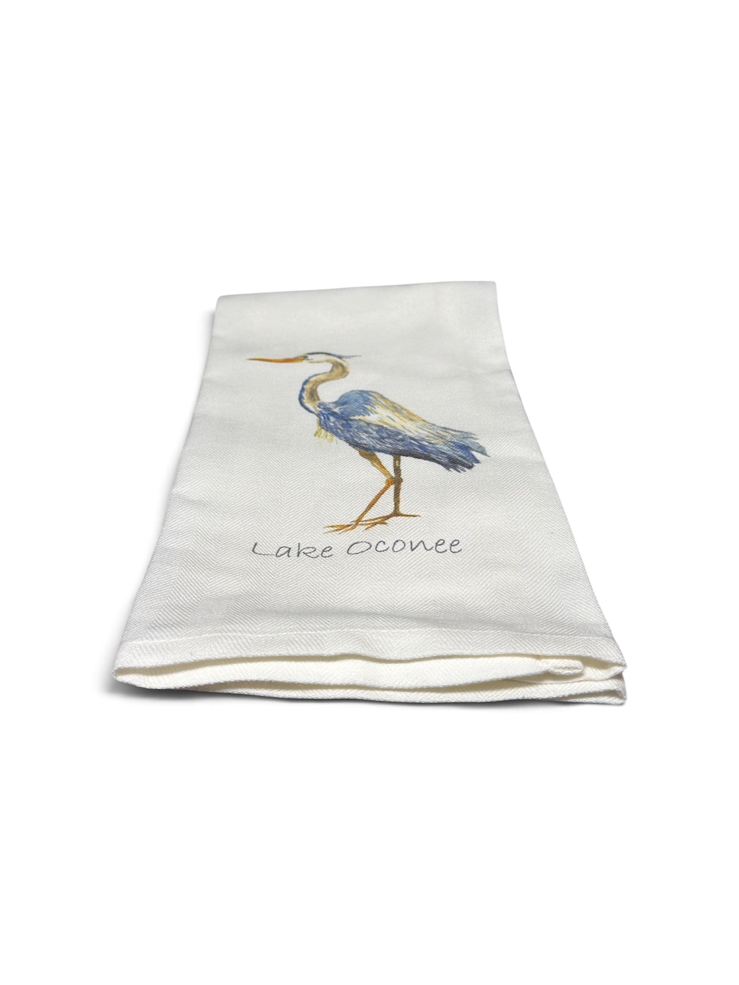 a white towel with a bird on it