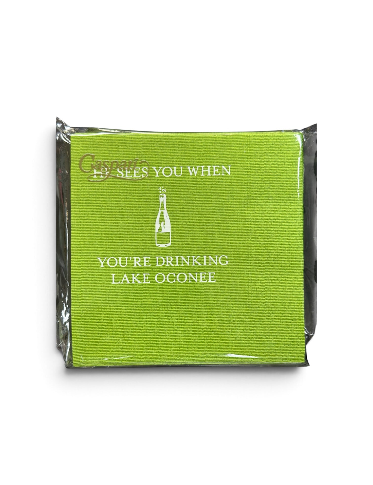 a green napkin in a plastic wrap