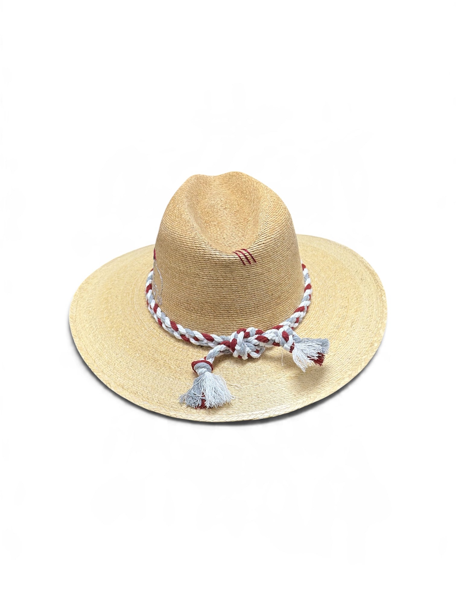 a straw hat with tassels