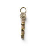 a key chain with bells on it